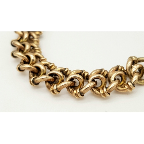67 - An Antique 1907, 9K Rose Gold Fancy Link Bracelet with Heart Clasp. 20cm. 17.48g. R-6370921.