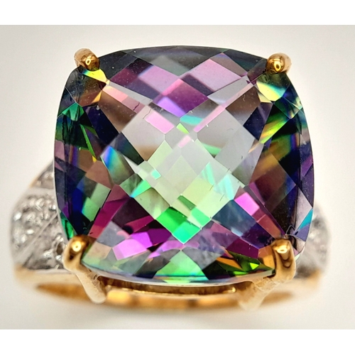132 - A 9K Yellow Gold Mystic Topaz Ring. 11.808ct, Brazilian Antique cut centre stone with white topaz ac... 