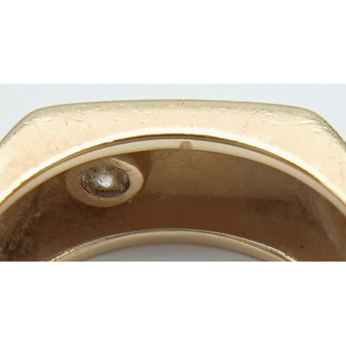 125 - A Stylish 14K Gold 'Le Mans' Diamond Signet Ring. 0.20ct round brilliant cut. Size R. 8.2g.