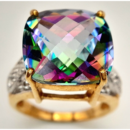 132 - A 9K Yellow Gold Mystic Topaz Ring. 11.808ct, Brazilian Antique cut centre stone with white topaz ac... 