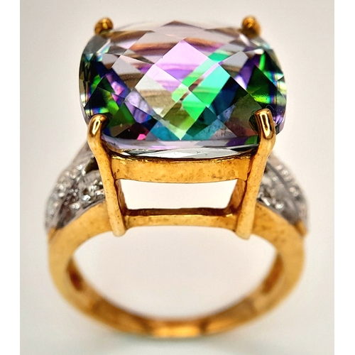 132 - A 9K Yellow Gold Mystic Topaz Ring. 11.808ct, Brazilian Antique cut centre stone with white topaz ac... 
