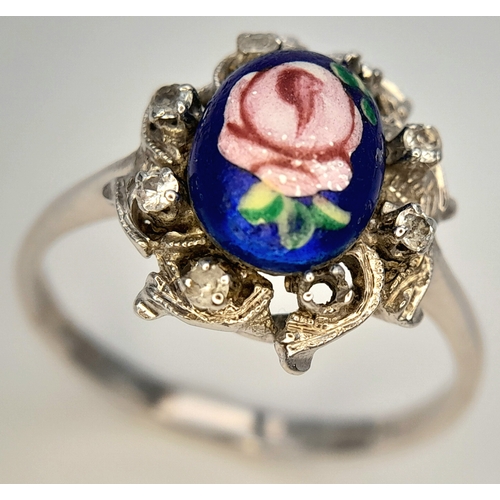 151 - An 18K WHITE GOLD FANCY FLORAL DESIGN DIAMOND SET RING. BEAUTIFUL PIECE. 4.7G TOTAL WEIGHT, SIZE R 1... 