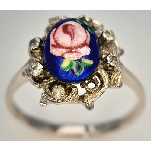 151 - An 18K WHITE GOLD FANCY FLORAL DESIGN DIAMOND SET RING. BEAUTIFUL PIECE. 4.7G TOTAL WEIGHT, SIZE R 1... 