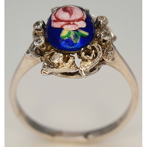 151 - An 18K WHITE GOLD FANCY FLORAL DESIGN DIAMOND SET RING. BEAUTIFUL PIECE. 4.7G TOTAL WEIGHT, SIZE R 1... 