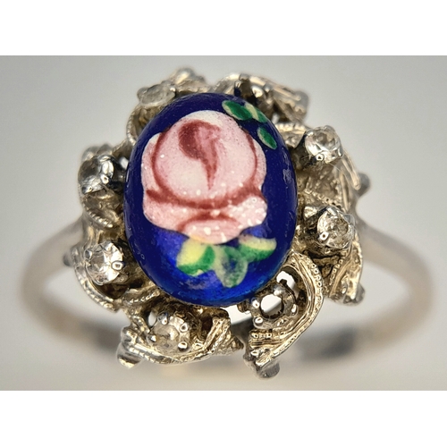 151 - An 18K WHITE GOLD FANCY FLORAL DESIGN DIAMOND SET RING. BEAUTIFUL PIECE. 4.7G TOTAL WEIGHT, SIZE R 1... 