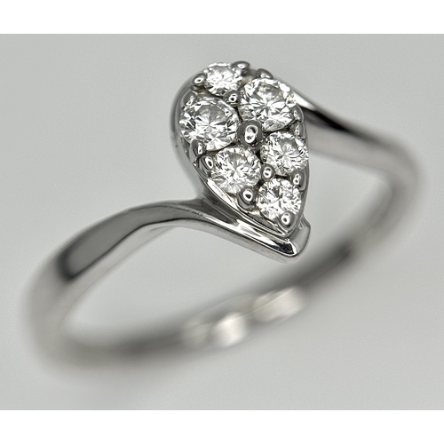 144 - AN 18K WHITE GOLD DIAMOND SET, PEAR SHAPED CROSSOVER RING. 0.25CTW. 3.7G. SIZE P. SC-5086.