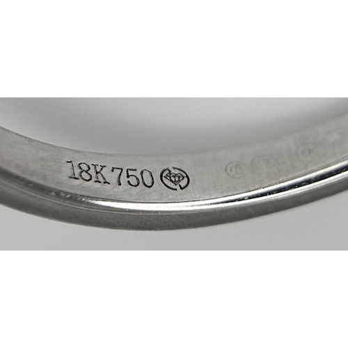 144 - AN 18K WHITE GOLD DIAMOND SET, PEAR SHAPED CROSSOVER RING. 0.25CTW. 3.7G. SIZE P. SC-5086.