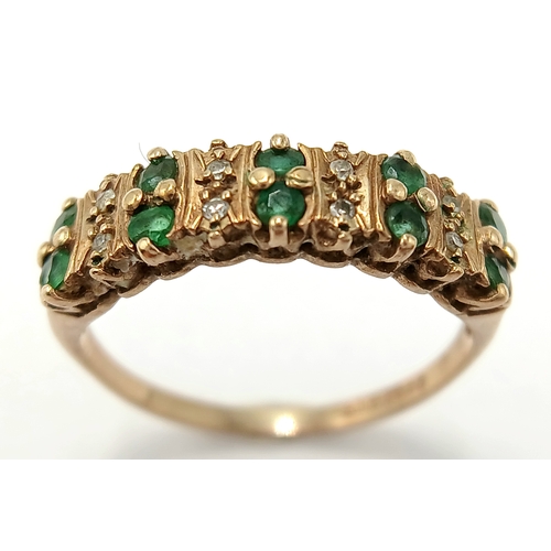 121 - A 9K Yellow Gold Emerald and Diamond Two Row Ring. Size K. 1.93g