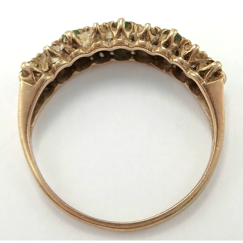 121 - A 9K Yellow Gold Emerald and Diamond Two Row Ring. Size K. 1.93g