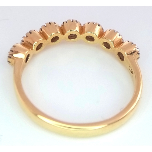 133 - Stunning 18 CARAT GOLD and DIAMOND RING, having 7 x COLETTE MOUNTED DIAMONDS in DAISY CHAIN FORMATIO... 