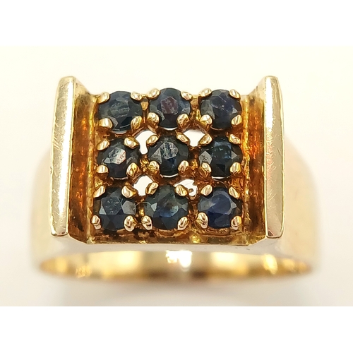 63 - Fabulous 9 CARAT GOLD and SAPPHIRE RING . Having 9 x SAPPHIRES  individually Claw Mounted to top. Fu... 