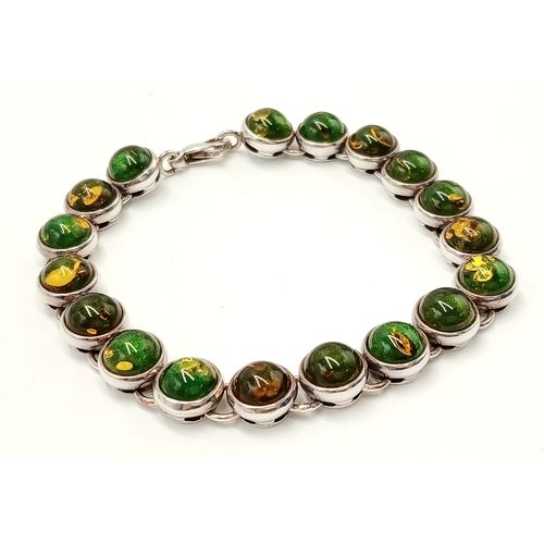 175 - Beautiful SILVER TENNIS BRACELET set with GREEN and AMBER COLOURED MOONSTONE. Full UK hallmark. 19.5... 