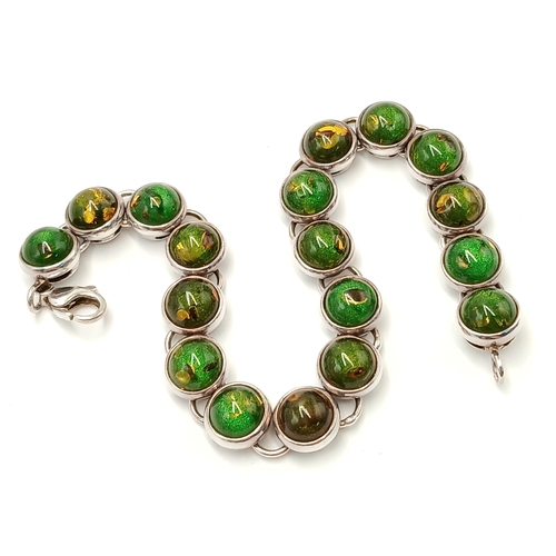 175 - Beautiful SILVER TENNIS BRACELET set with GREEN and AMBER COLOURED MOONSTONE. Full UK hallmark. 19.5... 