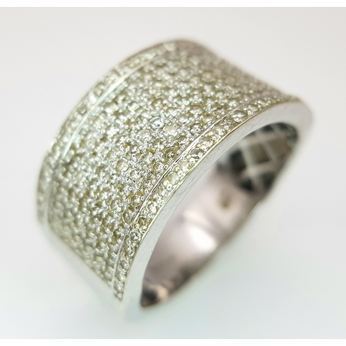 163 - A Gorgeous 18K White Gold and Diamond Cocktail Ring. Eight rows of pave diamonds - 1ctw. 12mm width.... 