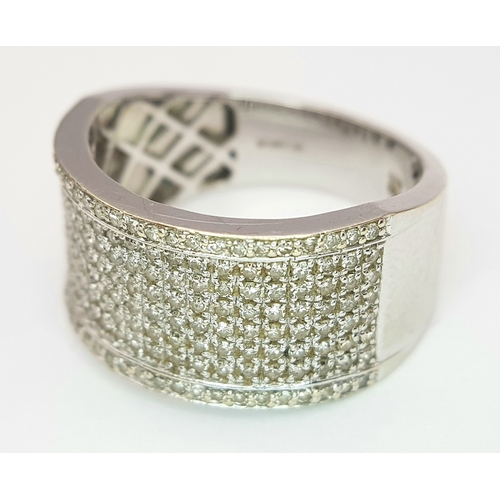 163 - A Gorgeous 18K White Gold and Diamond Cocktail Ring. Eight rows of pave diamonds - 1ctw. 12mm width.... 