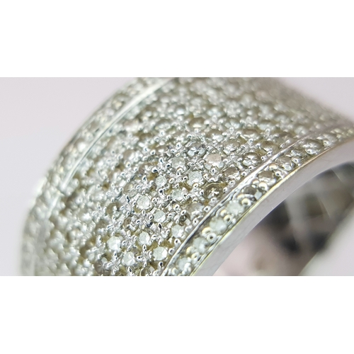 163 - A Gorgeous 18K White Gold and Diamond Cocktail Ring. Eight rows of pave diamonds - 1ctw. 12mm width.... 