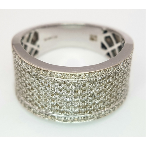 163 - A Gorgeous 18K White Gold and Diamond Cocktail Ring. Eight rows of pave diamonds - 1ctw. 12mm width.... 