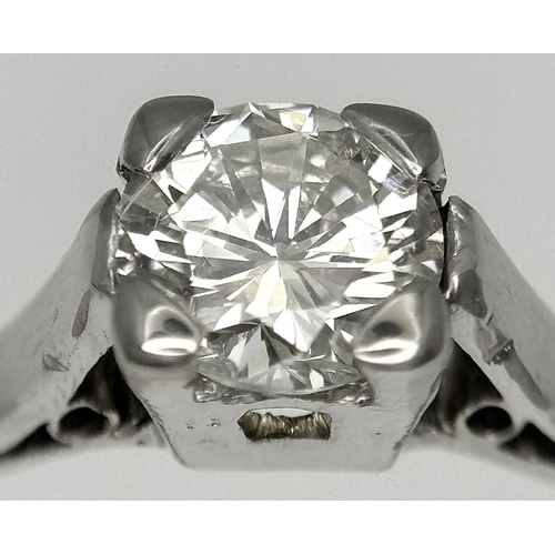 170 - An 18K White Gold Diamond Solitaire Ring. 0.50ct round brilliant cut diamond. SI1, Slightly champagn... 