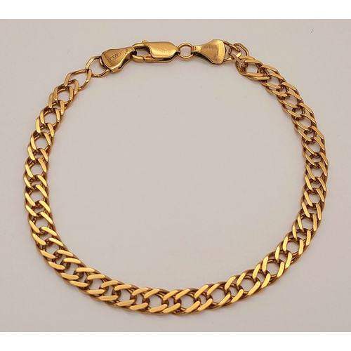 162 - A 9K Yellow Gold Double Curb Link Bracelet. 18cm. 5.3g.
