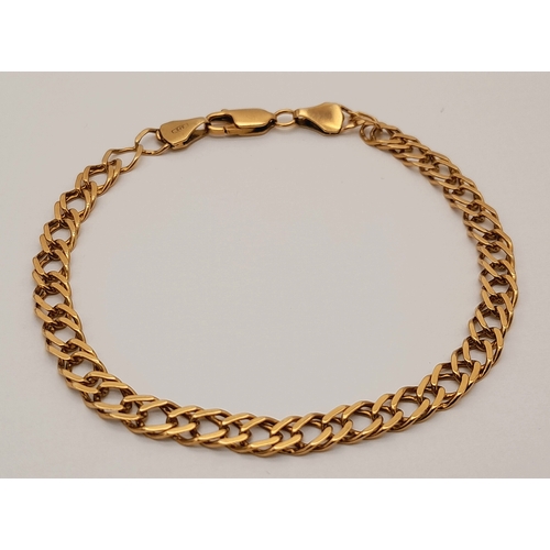 162 - A 9K Yellow Gold Double Curb Link Bracelet. 18cm. 5.3g.