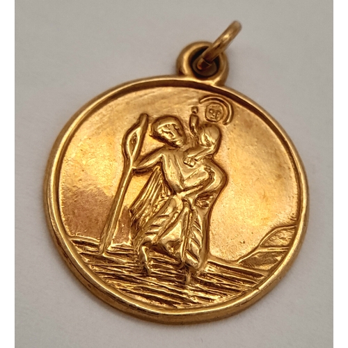 176 - A 9K Yellow Gold St. Christopher Pendant. 2cm. 2.77g