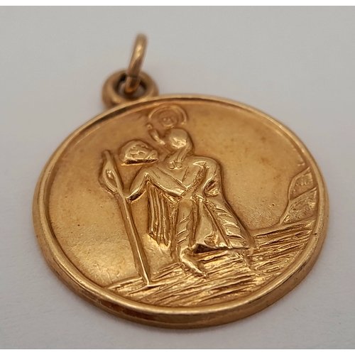 176 - A 9K Yellow Gold St. Christopher Pendant. 2cm. 2.77g