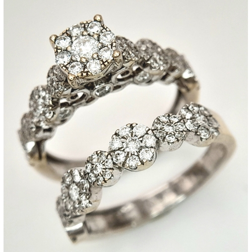 162 - Two 18K White Gold and Diamond Cluster Rings. Both size J. 
6.25g total weight. Ref: 6154205.