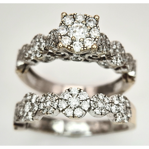 162 - Two 18K White Gold and Diamond Cluster Rings. Both size J. 
6.25g total weight. Ref: 6154205.