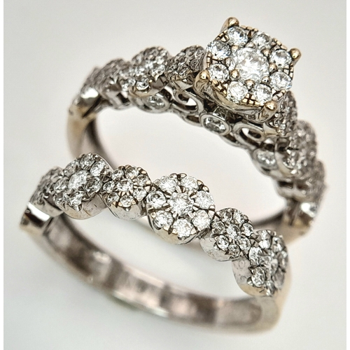 162 - Two 18K White Gold and Diamond Cluster Rings. Both size J. 
6.25g total weight. Ref: 6154205.