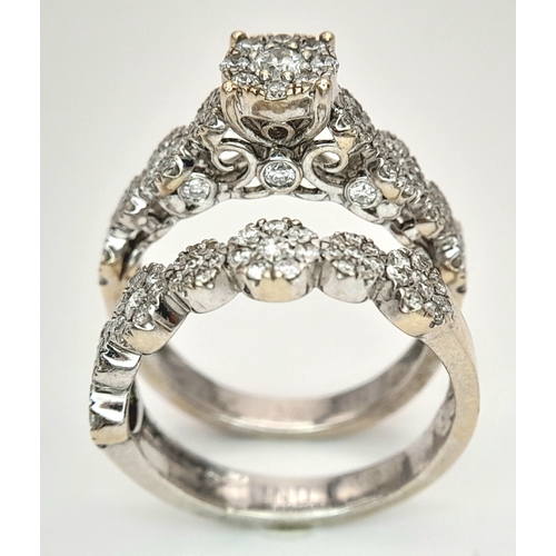 162 - Two 18K White Gold and Diamond Cluster Rings. Both size J. 
6.25g total weight. Ref: 6154205.