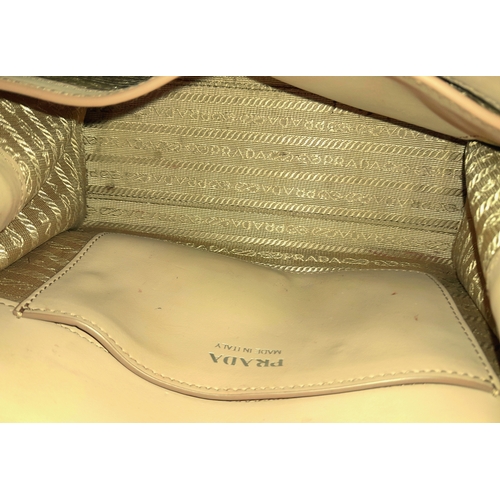 165 - A Prada Dusty Pink Monochrome Shoulder Bag. Saffiano leather exterior with silver-toned hardware, ch... 