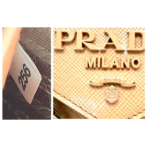 165 - A Prada Dusty Pink Monochrome Shoulder Bag. Saffiano leather exterior with silver-toned hardware, ch... 