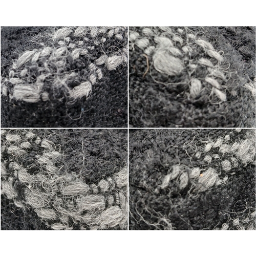 60 - A Chanel Black and Grey Tweed Flap Bag. Wool tweed exterior with gold-toned hardware, chain top hand... 