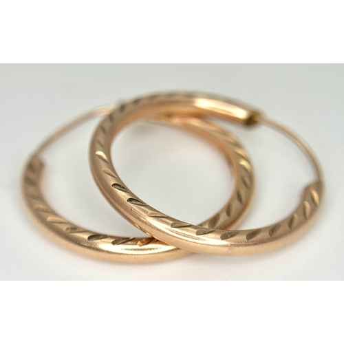 175 - Classic Pair of 9 CARAT ‘ROSE GOLD’ HOOP EARRINGS. Patterned Side Detail.  0.8 Grams. 2 cm Diameter.
