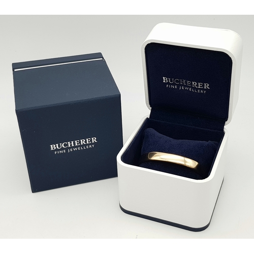 141 - A Bucherer 18K yellow gold solid bangle. Total weight 24.3G. Diameter 6.8cm. Comes with original pre... 