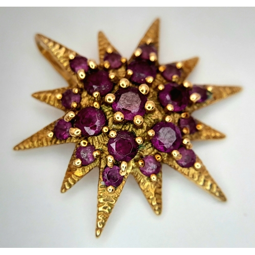 135 - A 9K Yellow Gold and Amethyst Star Pendant. 2.5cm. 2.93g.  
Ref: 2915805.