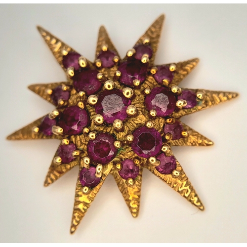 135 - A 9K Yellow Gold and Amethyst Star Pendant. 2.5cm. 2.93g.  
Ref: 2915805.