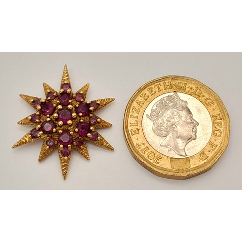 135 - A 9K Yellow Gold and Amethyst Star Pendant. 2.5cm. 2.93g.  
Ref: 2915805.