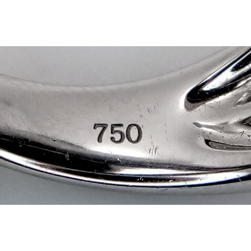 122 - A Head-Turning 18K White Gold, Diamond and Chrysoberyl (cat's eye) Ring. A large c.15ct chrysoberyl ... 