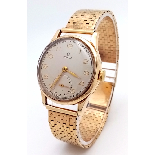 157 - A Vintage Omega 9K Gold Gents Dress Watch. 9k gold bracelet and case - 34mm. Cream dial with second ... 