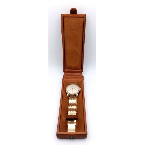 157 - A Vintage Omega 9K Gold Gents Dress Watch. 9k gold bracelet and case - 34mm. Cream dial with second ... 