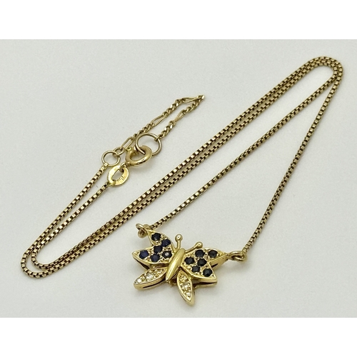 27 - A 18K YELOW GOLD DIAMOND & SAPPHIRE SET BUTTERFLY PENDANT ON CHAIN. TOTAL WEIGHT 5.8G. TOTAL LENGTH ... 