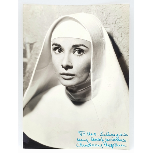 24 - An Audrey Hepburn Signed 'The Nun's Story' Headshot. Original, personalised signed photograph by Aud... 