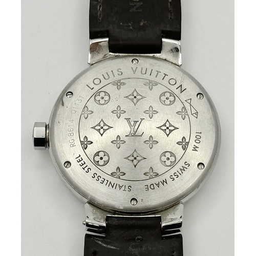 30 - A Louis Vuitton Tambour GMT Automatic Gents Watch. Brown leather strap. Stainless steel case - 39mm.... 
