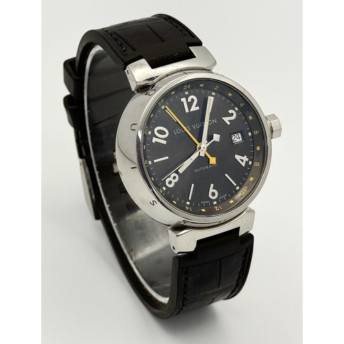 30 - A Louis Vuitton Tambour GMT Automatic Gents Watch. Brown leather strap. Stainless steel case - 39mm.... 