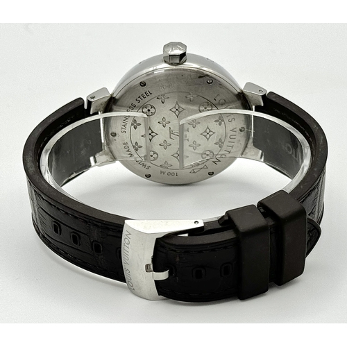 30 - A Louis Vuitton Tambour GMT Automatic Gents Watch. Brown leather strap. Stainless steel case - 39mm.... 