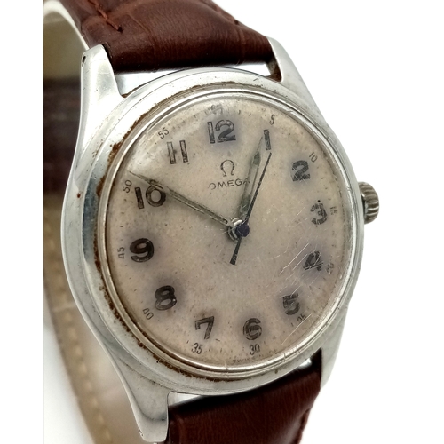 17 - A Vintage Omega Mechanical (hand-wind) Gents Watch. Brown leather strap. Stainless steel case - 34mm... 
