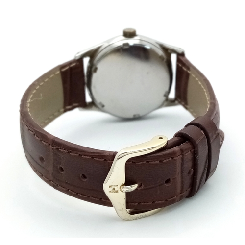 17 - A Vintage Omega Mechanical (hand-wind) Gents Watch. Brown leather strap. Stainless steel case - 34mm... 
