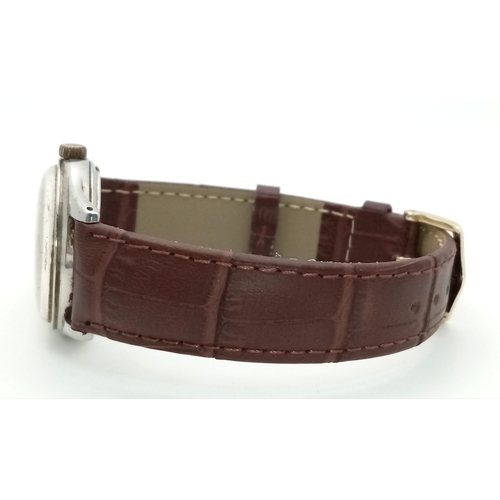 17 - A Vintage Omega Mechanical (hand-wind) Gents Watch. Brown leather strap. Stainless steel case - 34mm... 