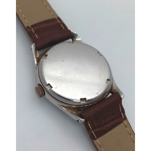 17 - A Vintage Omega Mechanical (hand-wind) Gents Watch. Brown leather strap. Stainless steel case - 34mm... 